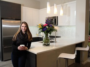 Kate Sales bought a unit in Slokker West's condo development Axess in Currie Barracks.