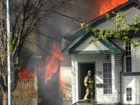 Fire crews were called to a blaze in the 10000 block of Hidden Valley Drive N.W. around 5 p.m. on Monday, April 20, 2015. The two-alarm fire affected four homes.
