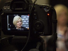 Rachel Notley speaks with media after an NDP rally at Hotel Arts in Calgary, on April 24, 2015.