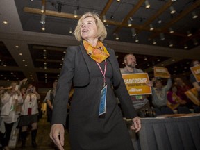 NDP Leader Rachel Notley makes her way to the podium through a sea of supporters during a campaign stop at the Alberta Federation of Labour convention in Calgary,on April 17, 2015.