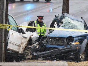 Police investigate the scene of a fatal collision on 37th Street S.W. between 45th and 46th Ave on Saturday afternoon. One person was deceased on the scene a second person was taken to hospital in serious condition.