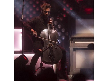 Brent Kutzle of One Republic rocks the cello during a concert at the Saddledome in Calgary, on April 30, 2015.