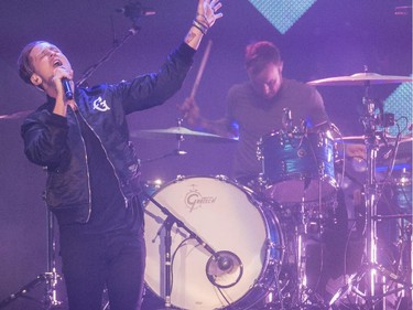 One Republic lead singer Ryan Tedder rocks the Saddledome with drummer Eddie Fisher in Calgary, on April 30, 2015.