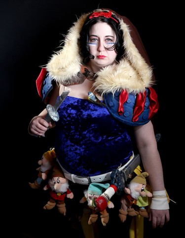 Megan Szarko as Warrior Snow White poses for a photo during the Calgary Comic Expo Parade of Wonders.