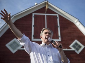 PC Leader Jim Prentice talks to supporters at the Calgary-Shaw Family BBQ at the big red barn in Shawnessy in Calgary, on April 28, 2015.