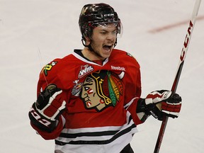 Ty Rattie celebrates a hat trick while playing for the Portland Winterhawks in the WHL