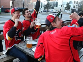 The Calgary Flames' first playoff game against the Vancouver Canucks had Jake Nagger, Brendon Skingle and Zach Nagger celebrating at the National in Calgary, on April 15, 2015.