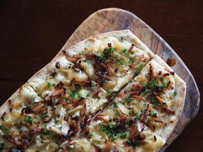 Tarte Flambe with double-smoked bacon, onions, creme fraiche and butter.