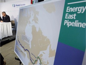 The Energy East pipeline's original route is pictured as TransCanada officials speak during a 2013 news conference in Calgary.