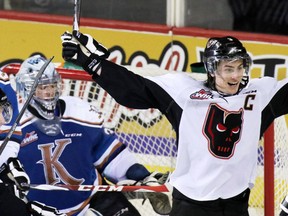 Calgary Hitmen captain Kenton Helgesen celebrates scoring a goal in Game 1 against the Kootenay Ice last Friday.