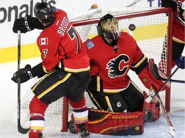 Calgary Flames goalie Jonas Hiller kept his eye on a flying shot by the Vancouver Canucks during third period NHL Game 3 playoff action at the Scotiabank Saddledome in Calgary on April 19, 2015. The Flames defeated the Canucks 4-2 to take a 2-1 lead in the best-of-seven series.