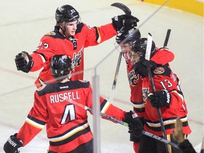 Calgary Flames celebrate a goal in the first period on the Arizona Coyotes on Tuesday night. With a 3-2 win, the Flames inched ever so close to wrapping up a playoff spot.