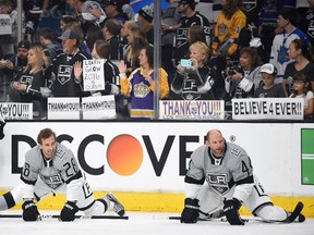 Jarret Stoll, left, and Robyn Regehr stretch before the Los Angeles Kings' final game of the NHL season on Saturday vs. San Jose. Regehr, who has played the second most games in Calgary Flames history, announced he's going to retire.