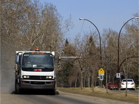 A street cleaner works his way down Bonaventure Drive S.E. in this file photo.