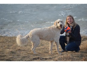 Shayna Nackoney-Skauge with Labradoodle Brewster at one of Airdrie's many off-leash areas.