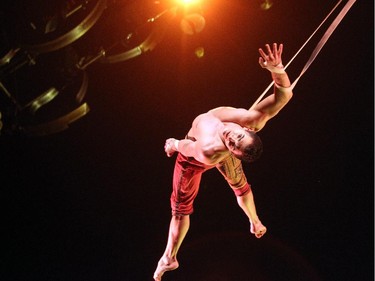 A Cirque du Soleil performer performed the Continent of Doubles aerial straps during Kurios Cabinet of Curiosities during their dress rehearsal night at the Calgary Stampede grounds on April 8, 2015.