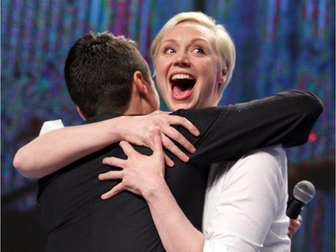 Gwendoline Christie from Games of Thrones hugs DJ Tanner as she was introduced on stage as she did a panel discussion in the Corral on Sunday April 19, 2015  as the Calgary Expo came to a close.