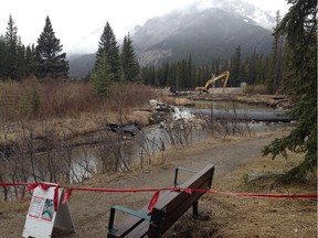 The cleanup continued at the site of a train derailment on the edge of the Banff townsite within Banff National Park on April 14, 2015.