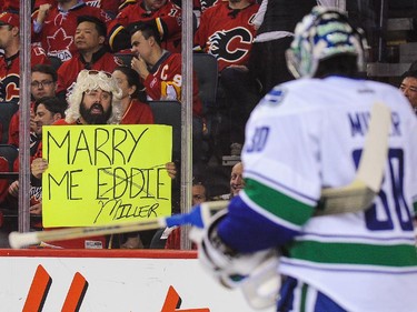 A Flames fan holds a sign for Canucks goalie Ryan Miller during Game Four.