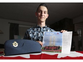 Crystal Schick/ Calgary Herald CALGARY, AB -- Michael Batas, 16 and a Royal Canadian Air Cadet, poses with the essay he wrote which won him a scholarship and trip to Vimy in France in April 2015, in Calgary, on April 1, 2015. --  (Crystal Schick/Calgary Herald) (For  story by  ) 00063924A