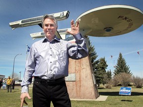Premier Jim Prentice made the 'Live Long and Prosper' sign as he made a campaign stop in the community of Vulcan on April 17, 2015.