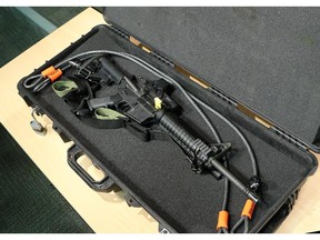 A police Colt C8 rifle in its case similar to one which was stolen from an off duty officer's private vehicle.