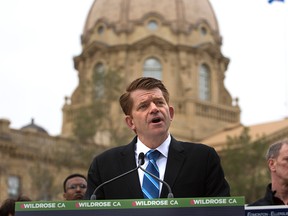 Wildrose party Leader Brian Jean on the front lawn of the Alberta Legislature holding a news conference to denounce "secret laws" his party says the PC government uses to hide expenses.