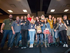 Winning brewers pose with the judges at the 2015 Okanagan Fest-of-Ale in Penticton. Ian Webster from Coal Harbour Brewing (centre) holds the Best of Show award for the brewery's Smoke and Mirrors Imperial Ale.