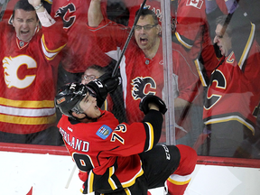 Calgary Flames left winger Michael Ferland celebrated after scoring the Flames second goal of the game against the Anaheim Ducks during first period NHL playoff action at the Scotiabank Saddledome on May 8, 2015.