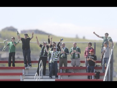 A group of Foothills FC fans chant, sing, and jeer during the home opening game versus the Puget Sound Gunners at Hellard Field in Calgary on Sunday, May 17, 2015.