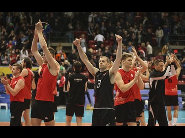 Team Canada celebrates their victory over Team Cuba at the Calgary Corral in Calgary on Sunday, May 17, 2015. Team Canada won over Team Cuba, 3-0, in the FIVB World League international men's volleyball tournament.