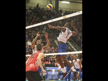 Team Cuba player Livan Osorio Rodriguez prepares to spike at the Calgary Corral in Calgary on Sunday, May 17, 2015. Team Canada won over Team Cuba, 3-0, in the FIVB World League international men's volleyball tournament.