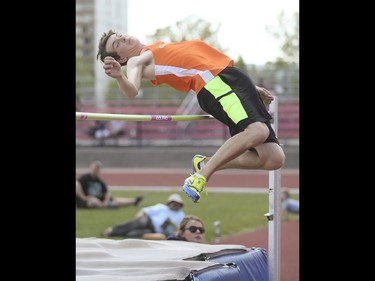 A high jump competitor from William Aberthart High School competes in the CSHSAA championships at the Foothills Athletic Park in Calgary on Saturday, May 23, 2015.