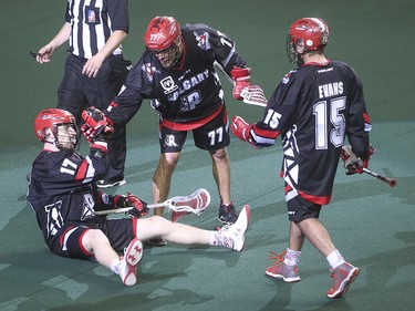 Roughnecks forward Curtis Dickson is pulled up after scoring the winning shot of the second game against the Edmonton Rush at the Scotiabank Saddledome in Calgary on Saturday, May 23, 2015. The Calgary Roughnecks won over the Edmonton Rush, 12-9, in game two of the National Lacrosse League west division final.