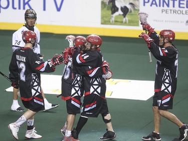 The Calgary Roughnecks celebrate a goal over the Edmonton Rush at the Scotiabank Saddledome in Calgary on Saturday, May 23, 2015. The Calgary Roughnecks led the Edmonton Rush, 9-7, in the first half of game two of the National Lacrosse League west division final.