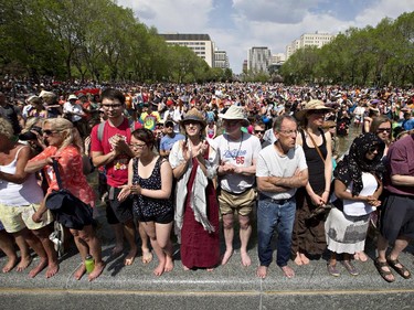 A crowd watches as Rachel Notley is sworn in as Alberta's 17th premier in Edmonton, on Sunday, May 24, 2015.