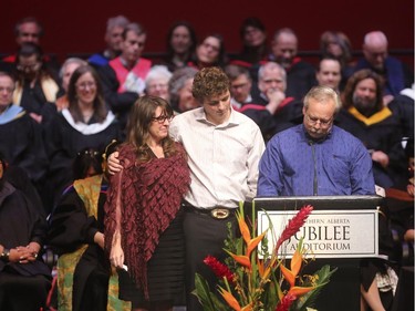 The family of Zackariah Rathwell, mom Ronda-Lee, brother Mason and father Bruce, receive his honorary degree from ACAD at the Southern Alberta Jubilee Auditorium in Calgary on Thursday, May 14, 2015. Zackariah was one of the 5 young people murdered in Brentwood last year.