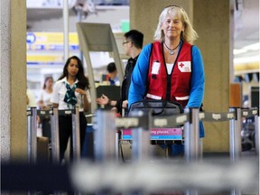 Calgary resident and Canadian Red Cross delegate Diana Coulter departs for aid work in Kathmandu, Nepal at the Calgary International Airport on Sunday, May 31, 2015.