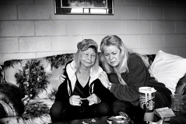 Barbi Harris and her friend Joan hang out a low-budget motel.