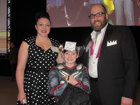 Cal 0530 Wish 13 Wishes came true for the Wylie family at the Children's Wish Foundation Gala held May 20 at the Telus Convention Centre. The Wylies will tour Universal Studios and see Harry Potter. Pictured are mom Lindy and dad Todd with their son Elijah. The super hero themed event raised more than $500,000.