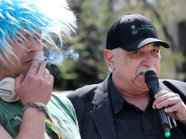 Marijuana legalization activist, Keith Fagan, right, speaks at the annual Global Marijuana March at City Hall on Saturday May 2, 2015.