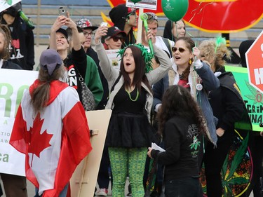 Calgarians take part in the annual Global Marijuana March at City Hall on Saturday May 2, 2015.