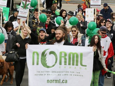 Calgarians take part in the annual Global Marijuana Marchat City Hall on Saturday May 2, 2015.