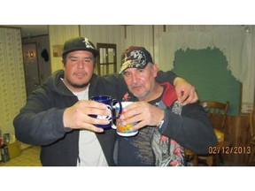 Jaron Giesbrecht, 26, left, has a drink with his father Roland Giesbrecht in February 2013. The 26-year-old was killed in the early hours of October 16, 2013 after being struck by a vehicle in east Calgary.