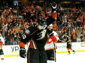 Anaheim Ducks superstar Corey Perry celebrates after assisting on a third period goal by Hampus Lindholm against the Calgary Flames in Game 2 on Sunday. Perry and his linemate Ryan Getzlaf have combined for 12 points in the first two games of the series.