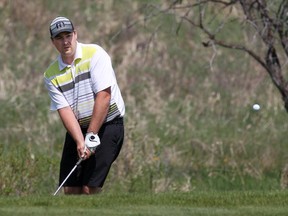 Nick Chomack eyes a chip during the final of the Calgary Golf Association's City Match Play Championship at Sirocco Golf Club on Sunday. He beat Jason Weightman 1-up by sinking an eight-foot birdie putt on No. 18.