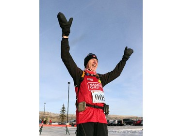 Martin Parnell finishes his last race for Right to Play in Cochrane, on December 31, 2014.