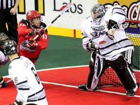 Calgary Roughnecks forward Curtis Dickson unleashes a shot on Edmonton Rush goalie Aaron Bold during a January meeting between the two Alberta National Lacrosse League rivals. They'll renew hostilities in Game 1 of the West Division final at Rexall Place on Friday night.