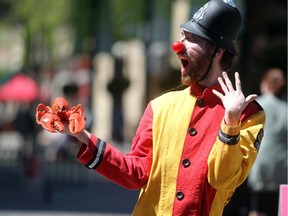 A clown performs at the Calgary International Children's Festival on Stephen Avenue Walk on on May 21, 2015. Organizers have announced that the festival will close.