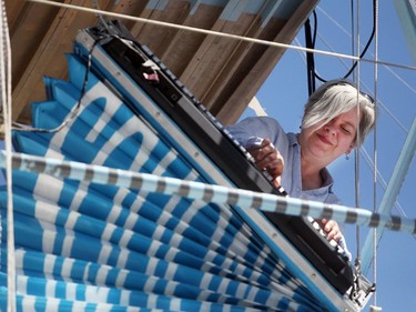 Squonk Opera keyboard player Jackie Dempsey performed on a moving keyboard for the crowd on the Medal Stage at the Calgary International Children's Festival on May 21, 2015.